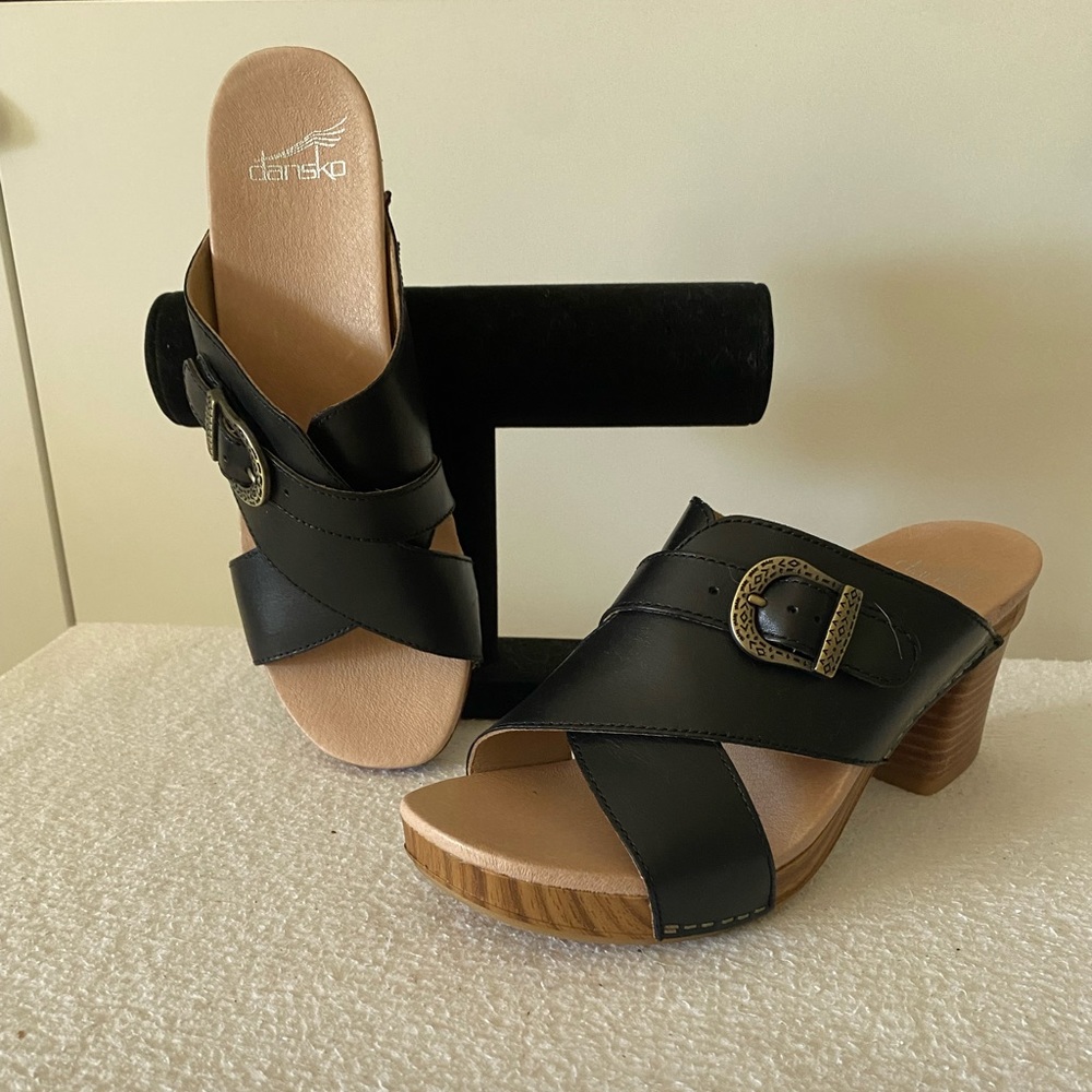 BNIB Dansko black leather platform clogs.